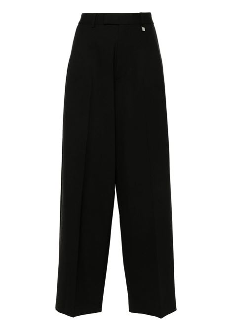 Black logo-plaque trousers Giuseppe di morabito - women